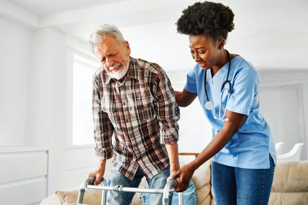 nurse doctor senior care caregiver help walker assistence retirement home nursing elderly man black
